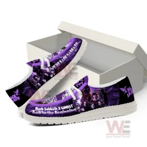 Purple slip on shoes with rock band inspired artwork displayed in a clean studio setting!