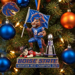 A tree ornament of a horse mascot in blue gear holding a flag posed over a rival with a trophy beside them on a Christmas tree!