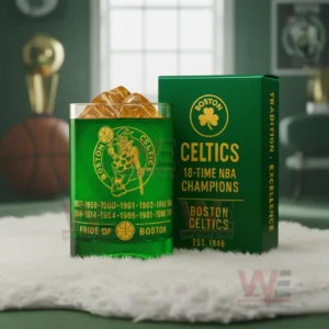 Boston Celtics 18-time NBA Champions Whiskey Glass 5 Green Celtics themed glass and box on a white rug with blurred sports elements behind them!