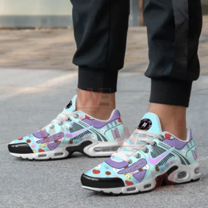 Pastel blue BTS shoes with character graphics worn by a person on pavement!