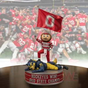 Mascot figure holding red flag with letter O standing on championship base with cheering team in the background!