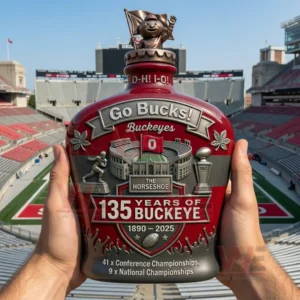 A held bottle with Ohio State anniversary designs shown inside a stadium!
