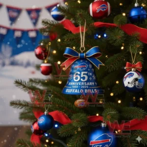 A blue Buffalo Bills anniversary bell ornament with a bow and snowflake details hanging on a decorated Christmas tree!