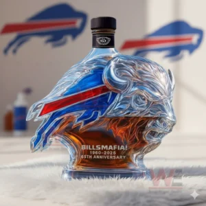 Buffalo head shaped whiskey bottle with blue red details and amber liquid on a white rug!