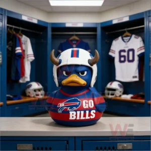 A Buffalo Bills rubber duck with a horned helmet and Go Bills jersey displayed in a football locker room.