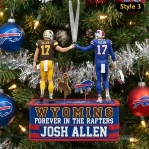 Holiday ornament showing two football quarterback figures in different uniforms posed together on a Christmas tree!