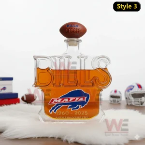 A bottle formed as the word Bills placed on a soft white surface with helmets and books in the background!