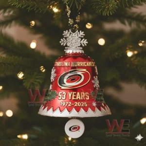 A close up of a red Carolina Hurricanes anniversary bell ornament with snowflake and holly details!