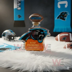 Carolina Panthers 30th Anniversary Whiskey Bottle 4 A Carolina Panthers bottle is displayed on a fluffy white rug surrounded by team gear and footballs!