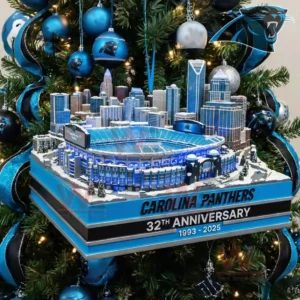 Carolina Panthers stadium anniversary ornament with skyline details displayed on a decorated Christmas tree!