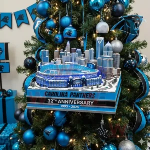 Carolina Panthers anniversary stadium ornament displayed at the center of a decorated holiday tree!