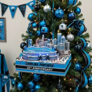 Wide view of Carolina Panthers stadium anniversary ornament displayed on a themed Christmas tree!