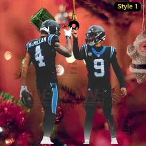Holiday ornament design featuring two football players in dark uniforms celebrating together against a festive Christmas background!