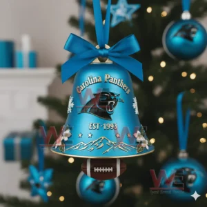 A blue Carolina Panthers holiday bell ornament with snowflakes flowers and team branding hanging on a Christmas tree!