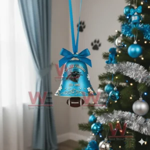 Carolina Panthers NFL Christmas Bell Ornament 4 A blue Carolina Panthers bell ornament with floral and snowflake designs hanging on a decorated Christmas tree!