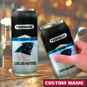 Two custom Carolina Panthers can shaped tumblers placed on a wooden bar surface with team graphics and a name panel!