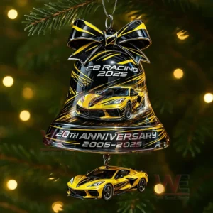 Racing themed Christmas bell ornament in black and yellow with a sports car detail hanging on a decorated tree!