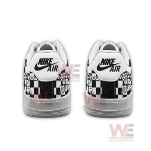 Back view of two black and white sneakers with Nike Air heel tabs and checkerboard text graphics placed side by side on a white background.