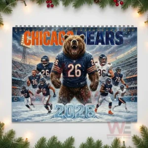 Chicago Bears twenty twenty six calendar cover with a roaring bear mascot and players running through snow in a stadium!
