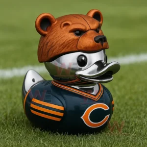 Rubber duck with a bear helmet and football jersey placed on grass with a blurred field background!