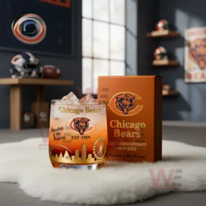 Chicago Bears Monsters Of The Midway Whiskey Glass 4 Product image showing a Chicago Bears themed glass and box on a white rug with football decor arranged behind them!