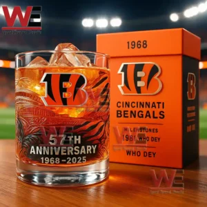 A Cincinnati Bengals fifty seven year anniversary glass with ice next to an orange team box on a field!