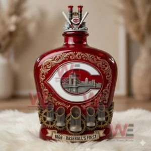 Red commemorative bottle featuring Cincinnati Reds themed artwork city bridge imagery and baseball inspired design in an elegant interior setting!