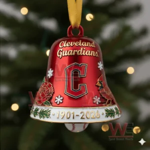 A close up of a red Cleveland Guardians anniversary bell ornament with floral snowflake and baseball themed details!