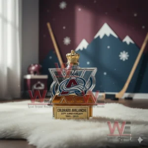 A Colorado Avalanche logo shaped bottle with a gold crown topper placed on a white rug in a hockey themed room with mountain artwork!