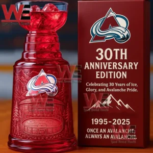 A red Colorado Avalanche thirtieth anniversary glass with engraved arena design standing beside a red anniversary box!