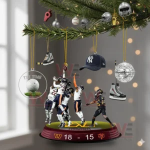 Sports themed ornaments including football figures and mixed sports decor hanging from a tree branch.