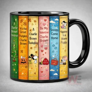 Hand holding a Snoopy themed bookshelf design mug on a wooden table with warm decorative lights in the background!