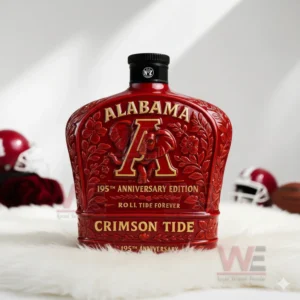Crimson colored whiskey bottle with ornate design representing Alabama pride!
