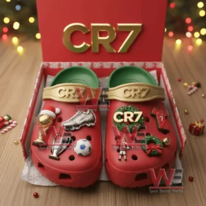 Red CR7 clogs inside a festive box adorned with football trophies shoes and Christmas wreath charms!