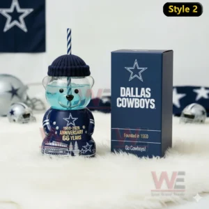 Dallas Cowboys bear shaped glass cup with blue liquid shown next to a team branded box!