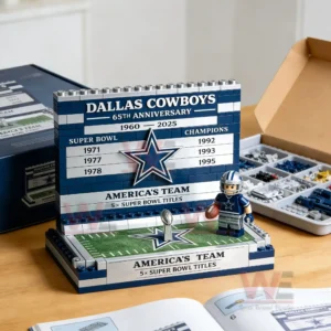Brick football display with a commemorative team board a small player figure on a field base and building pieces arranged nearby on a tabletop!