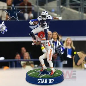 A blue uniformed football player jumping over a red uniformed player during an intense play on a display base with a star logo!