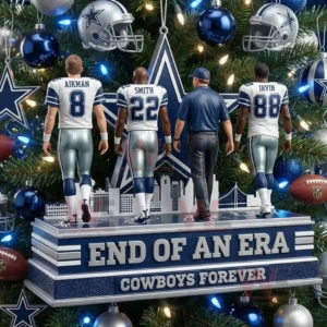 A group of small figures representing legendary Cowboys players and a coach positioned on a stand before a decorated holiday tree filled with team colors and ornaments!