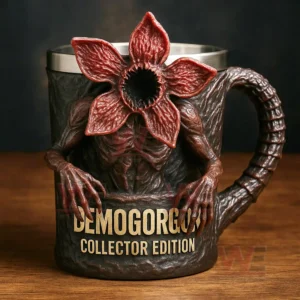 A dark fantasy collector mug shaped like a creature with a flower head and long arms gripping the cup shown on a wooden table!
