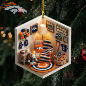 A small detailed Broncos themed room ornament hanging on a tree with miniature furniture decorations and team memorabilia arranged inside!