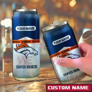 Two custom Denver Broncos can shaped tumblers placed on a wooden bar surface with team graphics and an editable name panel!