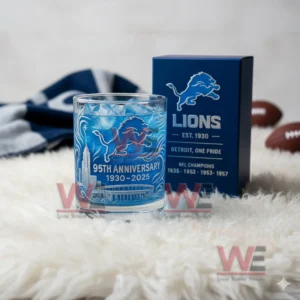 Detroit Lions anniversary glass and box displayed on a soft white surface with football items in the background!