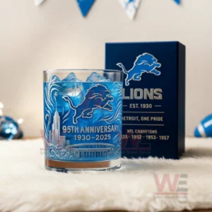 Close up of a Detroit Lions themed glass and box on a white surface with blue decorative elements behind them!