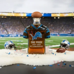 Detroit Lions 95th Anniversary Whiskey Bottle 5 Detroit Lions jersey shaped anniversary bottle with helmets confetti and football on white fur in a stadium.