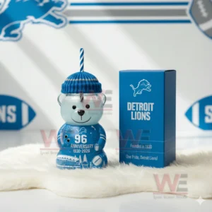 Bear shaped glass cup with Detroit Lions anniversary design shown with football decorations!
