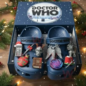 Blue clogs with themed charms placed inside a decorated box inspired by a time travel series!