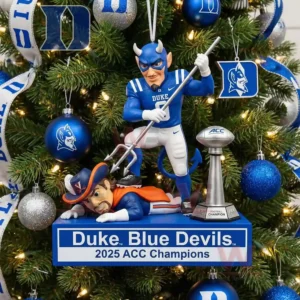 A Christmas tree ornament of the Duke Blue Devils mascot standing over a Virginia figure with an ACC trophy surrounded by blue and silver decorations!