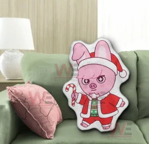 Dwaekki Stray Kids Custom Shaped Pillow 6 Festive pink cartoon pig shaped pillow on a green sofa in a living room!