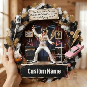 Christmas wreath ornament with rock and roll singer figure in white stage outfit surrounded by guitar microphone records lightning symbols and custom name plaque!