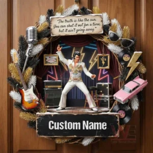Close up of a christmas wreath ornament featuring a rock style stage scene with white suit singer guitars microphone records and decorative elements!